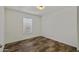 Bedrooms features natural light with a window, modern flooring and paint at 5601 W Missouri Ave # 150, Glendale, AZ 85301