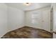 Bedroom features natural light, a window, closet and modern flooring at 5601 W Missouri Ave # 150, Glendale, AZ 85301
