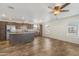 A bright, open floorplan combines living room, kitchen, and modern fixtures at 5601 W Missouri Ave # 150, Glendale, AZ 85301