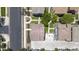 Aerial view shows the home's large driveway, landscaping, and proximity to neighborhood streets at 5749 S 21St Ter, Phoenix, AZ 85040