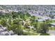 This aerial view captures the expansive community park with a pool, playground, and lush greenery at 5749 S 21St Ter, Phoenix, AZ 85040