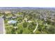 Aerial view showcases community park with swimming pool, baseball field, playgrounds, and green spaces at 5749 S 21St Ter, Phoenix, AZ 85040