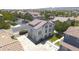 Aerial view showcases this beautiful two-story home with an attached two-car garage and manicured lawn at 5749 S 21St Ter, Phoenix, AZ 85040