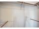 Walk-in closet featuring ample storage space with multiple rods for hanging clothes at 608 E Arabian Ct, Gilbert, AZ 85296