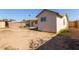 A partially shaded backyard with some grass at 8051 W Mariposa Dr, Phoenix, AZ 85033
