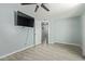 Bright bedroom with ceiling fan and neutral colors promotes relaxation at 8051 W Mariposa Dr, Phoenix, AZ 85033