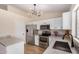 Modern kitchen features stainless steel appliances and granite countertops at 8103 E Dartmouth St, Mesa, AZ 85207