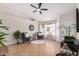 Comfortable living room featuring neutral colors and a ceiling fan for maximum comfort at 8103 E Dartmouth St, Mesa, AZ 85207