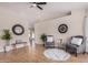 Comfortable living room featuring neutral colors, hardwood floor and a ceiling fan for maximum comfort at 8103 E Dartmouth St, Mesa, AZ 85207