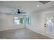 Bright bedroom with plantation shutters, recessed lighting, ceiling fan, and access to the outside at 8318 E Sells Dr, Scottsdale, AZ 85251