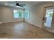 Minimalist room design with wood grain floors and modern white trim at 8318 E Sells Dr, Scottsdale, AZ 85251