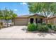 Charming single-story home with desert landscaping, a two-car garage, and a welcoming front porch at 907 E Kelsi Ave, San Tan Valley, AZ 85140