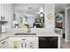 Kitchen sink and granite countertop, with view to the living room at 907 E Kelsi Ave, San Tan Valley, AZ 85140