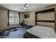 This bedroom is set up as a workout room and has a murphy bed for overnight guests at 9196 E Evans Dr, Scottsdale, AZ 85260