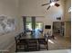 Bright dining area next to an outdoor patio and featuring a full-sized table and seating for eight at 9196 E Evans Dr, Scottsdale, AZ 85260