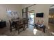 Dining area adjacent to the kitchen featuring sliding glass doors to an outdoor patio space at 9196 E Evans Dr, Scottsdale, AZ 85260