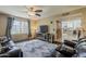 Cozy living room with dark wood floors open to the kitchen at 9196 E Evans Dr, Scottsdale, AZ 85260