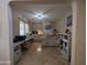Office space is fully equipped with built-in storage, multiple desks, and ample workspace at 9196 E Evans Dr, Scottsdale, AZ 85260