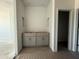 Bathroom features a gray vanity with plenty of storage space at 9531 W Parkway Dr, Tolleson, AZ 85353