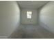 Spacious bedroom featuring a window, offering natural light and a serene atmosphere at 9531 W Parkway Dr, Tolleson, AZ 85353