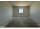 This bedroom offers a cozy space with a window and ample natural light at 9531 W Parkway Dr, Tolleson, AZ 85353