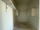 Walk-in closet with shelving and rack at 9531 W Parkway Dr, Tolleson, AZ 85353