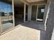 Back patio with view into the home and the surrounding landscape at 9531 W Parkway Dr, Tolleson, AZ 85353