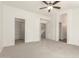 Empty bedroom features plush carpeting, ample closet space, and a vaulted ceiling at 9649 S 51 St St, Phoenix, AZ 85044