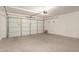Spacious two car garage with white door at 9649 S 51 St St, Phoenix, AZ 85044
