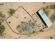 Desert property featuring a stable for horses or other animals, enclosed by fencing at 10600 E Cordova St, Gold Canyon, AZ 85118