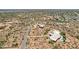 Panoramic aerial view of scattered homes in a vast desert landscape with rugged mountains at 10600 E Cordova St, Gold Canyon, AZ 85118