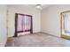 View of a bedroom featuring a ceiling fan and access to the exterior patio at 10600 E Cordova St, Gold Canyon, AZ 85118