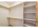 View of the interior of a closet with shelves and rods at 10600 E Cordova St, Gold Canyon, AZ 85118