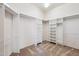 Bright walk-in closet featuring multiple shelves and hanging racks at 10600 E Cordova St, Gold Canyon, AZ 85118