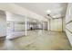 Spacious garage with multiple bay doors, high ceilings, and ample room for parking and storage at 10600 E Cordova St, Gold Canyon, AZ 85118