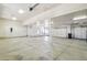 Spacious garage with multiple bay doors, high ceilings, and ample room for parking and storage at 10600 E Cordova St, Gold Canyon, AZ 85118