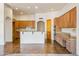 Kitchen featuring ample cabinets, granite countertops, stainless appliances, and a breakfast bar at 10600 E Cordova St, Gold Canyon, AZ 85118
