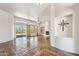 Spacious living room featuring Saltillo tile, fireplace, and backyard access with desert views at 10600 E Cordova St, Gold Canyon, AZ 85118