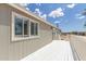 The white back deck wraps around the house and offers plenty of space for outdoor entertaining at 11912 N Thunderbird Rd, Maricopa, AZ 85139