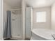 This bathroom features a shower and tub combination at 11912 N Thunderbird Rd, Maricopa, AZ 85139