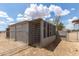 This large chicken coop has access to both covered and uncovered space to suit the birds' needs at 11912 N Thunderbird Rd, Maricopa, AZ 85139