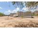 Charming single story home featuring neutral paint, contrasting trim and mature trees at 11912 N Thunderbird Rd, Maricopa, AZ 85139