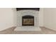 Close up of fireplace featuring white stone surround and hearth at 11912 N Thunderbird Rd, Maricopa, AZ 85139