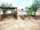 Small gardening and compost area with wood enclosures, fenced and ready for planting at 11912 N Thunderbird Rd, Maricopa, AZ 85139