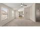 Bright living area with a view into the kitchen at 11912 N Thunderbird Rd, Maricopa, AZ 85139