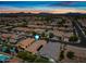 Panoramic aerial view of a suburban neighborhood during sunset, with homes and streets at 1344 N Claiborne --, Mesa, AZ 85205