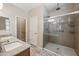 Bathroom featuring a double vanity and glass enclosed shower with showerhead at 1344 N Claiborne --, Mesa, AZ 85205