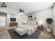 This staged bedroom showcases a comfortable bed and calming decor at 1344 N Claiborne --, Mesa, AZ 85205