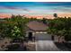 Charming single-story home showcasing a tile roof and well-maintained landscaping at 1344 N Claiborne --, Mesa, AZ 85205