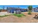 Backyard with a grill, concrete structure, and room for gardening at 13913 N 2Nd Ave, El Mirage, AZ 85335
